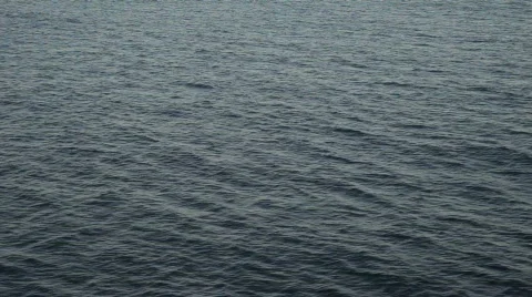 Ocean surface waves passing P HD 4316 Stock Footage 571083