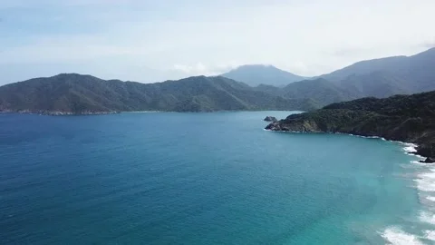 Ocean Surrounded By Mountains Aerial View Видео 165050668