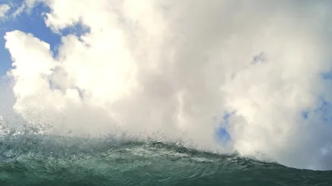 Ocean Swell Rolling Below Towering White Clouds From Low Angle Stock Footage 344389000