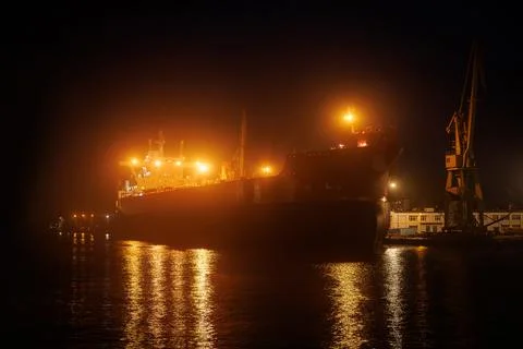 Ocean tanker loading at dock. Stock Photos
