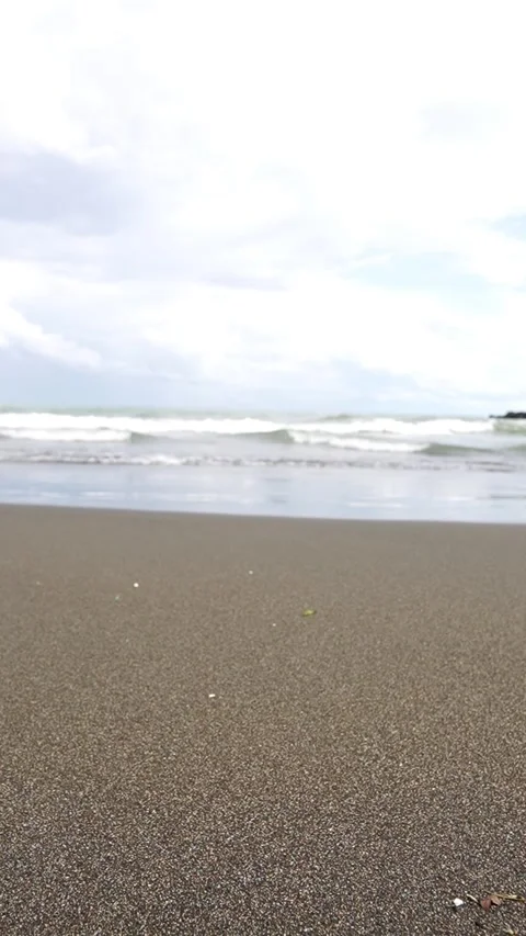 Ocean Tide Washing Over Sandy Beach Shoreline, Gentle Sea Waves Video stock 325659855