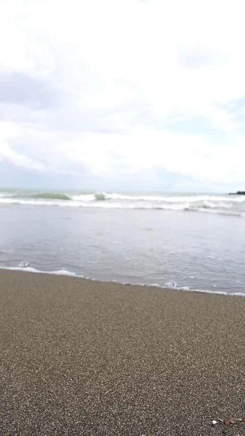 Ocean Tide Washing Over Sandy Beach Shoreline, Gentle Sea Waves Video stock 325659890