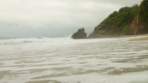 Ocean Tide Waves Breaking on Remote Tropical Rugged Coastline, Slow-mo Stock Footage 346652480