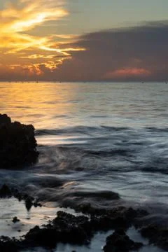 Ocean under cloudy sky Stock Photos