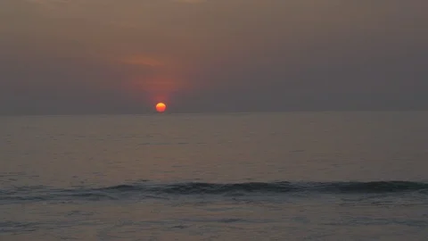 Ocean under sunset on Jimbaran beach, Indonesia. 動画素材 90749696