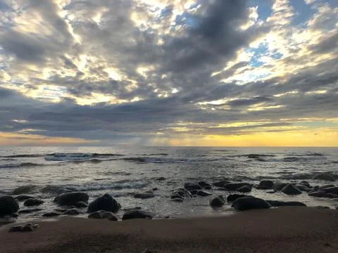 The ocean under the sunset of a new night Stock Photos