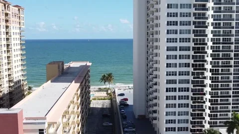 ocean view from above between you and white buildings Stock Footage 145403815