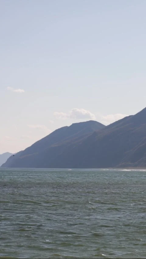 Ocean view and green cliffs. Beautiful seascape Stock Footage 309408520