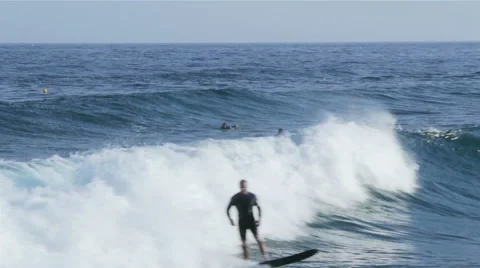 Ocean view and wave surfer in Tavira Island, Algarve Stock Footage 51136496