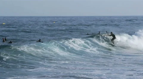Ocean view and wave surfers crowd in Tavira Island Stock Footage 51138124