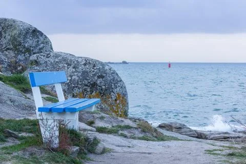 Ocean View from Blue Bench in Brittany France Stock Photos