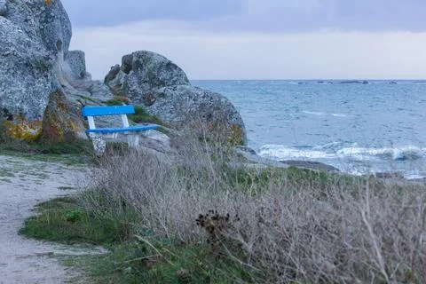 Ocean View from Blue Bench in Brittany France Stock Photos