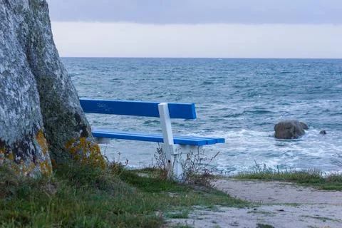 Ocean View from Blue Bench in Brittany France Stock Photos