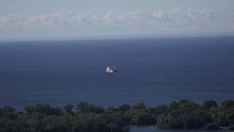 Ocean View with a Cargo Ship 4K Stock Photos