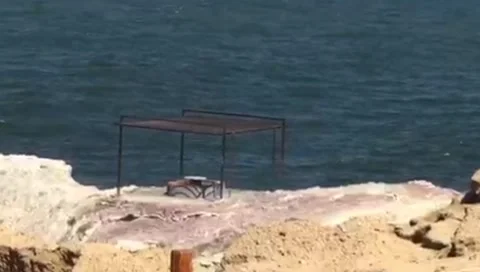 Ocean view from a cliff with a structure Stock Footage 317599113
