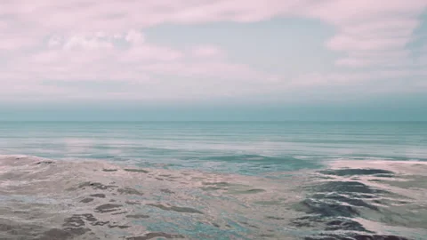 Ocean view with gentle waves and cloudy sky at sunrise Stock Footage 344849586
