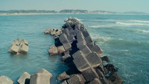 Ocean view of tetrapod pier in coastal Japan. Stock Footage 305678697