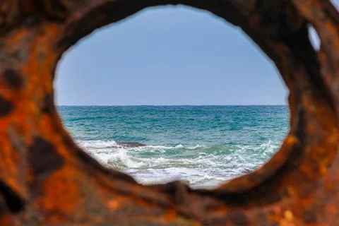 Ocean View Through Rusted Ship Porthole - September 20, 2011 Stock Photos