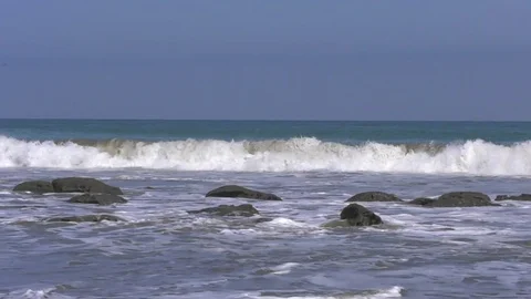 Ocean view with waves on a sunny day Stock Footage 82594591