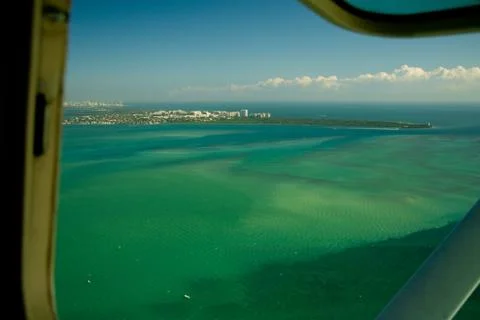 Ocean viewed from a airplane window Stock Photos