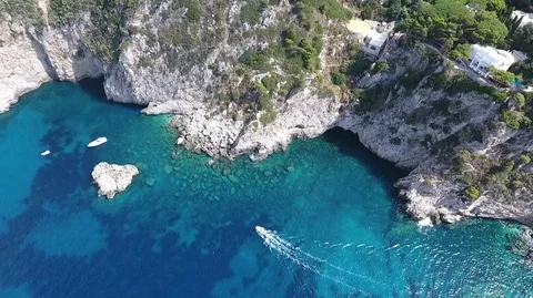 Ocean washes the shore of the rocks, birds fly Stock Footage 80741746