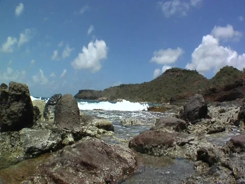Ocean washing up to camera on shore Stock Footage 708910