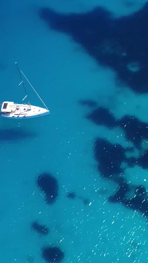 Ocean Water From Above Showing Waves, Reflections, and Shadows During Mid-Day Stock Footage 333921181