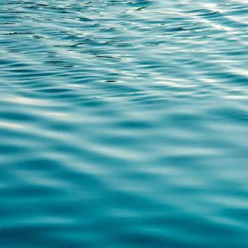 Ocean water background abstract background of seawater flow under light exposure Stock-Fotos