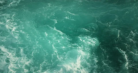 Ocean water background at storm. Blue aquamarine sea waves swaying in the wind Stock Footage 238484725