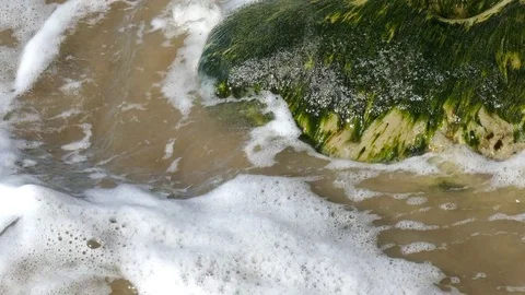 Ocean Water Breaks Over Rocks Stock Footage 78080111