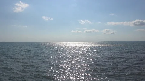 Ocean Water With Clouds In Sky During Midday Stock Footage 96319880