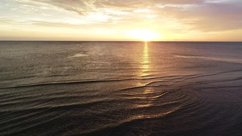 Ocean water in evening sun Stock Footage