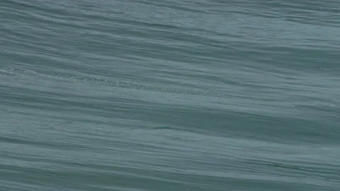 Ocean water surface moving around and waves breaking and splashing Stock Footage 155595686