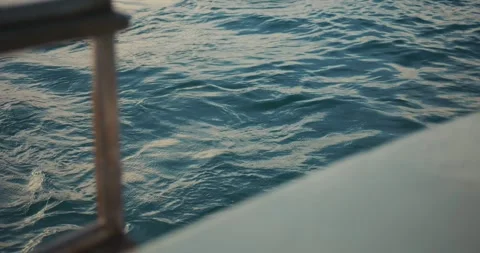Ocean Water Texture with Wake Beside Moving Boat Stock Footage 327303878