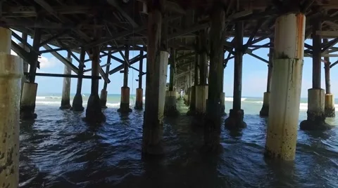 Ocean Water under Pier, still shot daytime Stock Footage 68323090