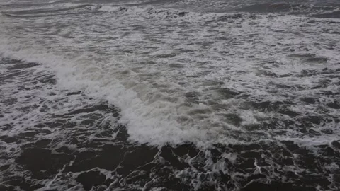 Ocean wave breaking with foam from drone above. Aerial breaking wave closeup. Stock Footage 329622834