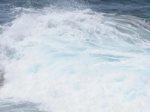 Ocean wave breaking Stock Photos