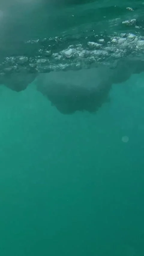 Ocean wave breaks on the camera Stock Footage 314721622