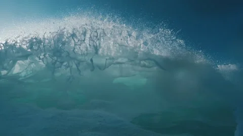 Ocean wave breaks on the camera, speed warp effect with frozen motion. Atlantic Stock Footage 329049556