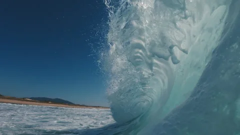 Ocean wave breaks on the camera, speed warp effect with frozen motion. Atlantic Stock Footage 329770391