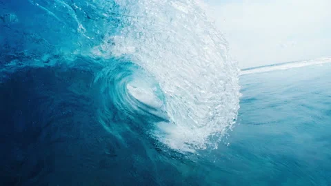 Ocean wave breaks with spray in Maldives Stock Footage 168770653