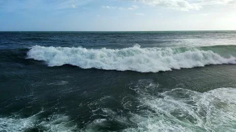 Ocean wave crest foam surface water texture horizon sky Stock Photos