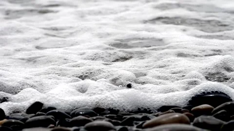 Ocean Wave Current Gently Coming In Over Beach Rocks Stock Footage 272510378