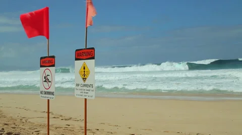 Ocean wave dangerous rip currents sign shore break Stock Footage 34389373