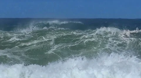 Ocean wave evolution formation big wave splashing slow motion blue sky Stock Footage 60143148