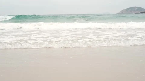 Ocean wave with foam and sandy shore, summer background. Stock Footage 272425569