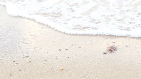 Ocean wave hit the beach,Sea waves with wave crashing on sandy shore Stock Footage 110104918