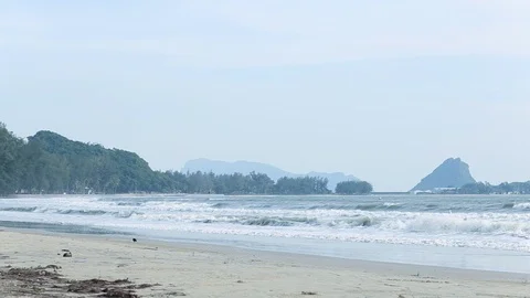Ocean wave hit the beach,Sea waves with wave crashing on sandy shore Stock Footage 110106797