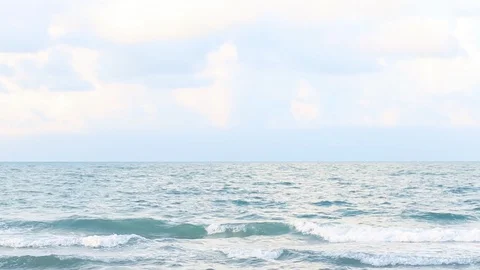 Ocean wave hit the beach,Sea waves with wave crashing on sandy shore  Stock Footage 111275418