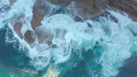 Ocean wave, spindrift, rock Stock Footage
